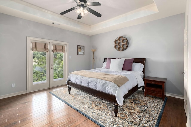 4101 Top Of Texas Trl, Austin, TX 78735 - bedroom with a tray ceiling, ornamental molding, access to outside, french doors, and wood finished floors