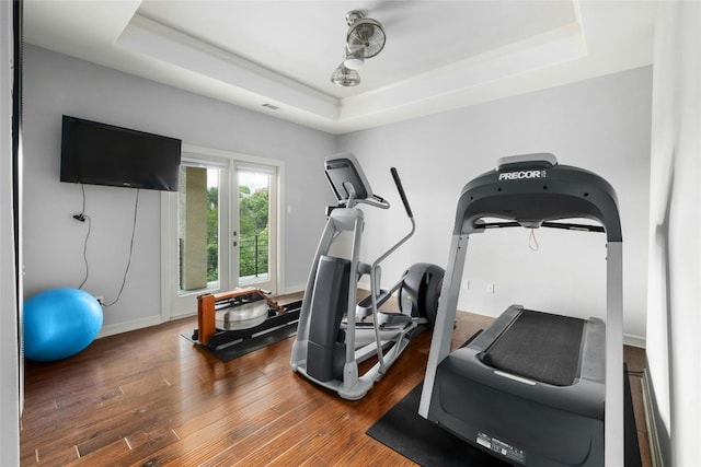 4101 Top Of Texas Trl, Austin, TX 78735 - exercise area with a tray ceiling and wood finished floors