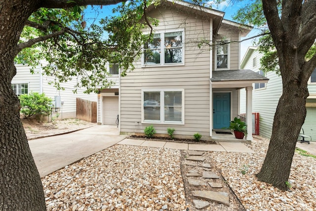 10701 Garbacz Dr, Austin, TX 78748 - view of front of home with concrete driveway and an attached garage