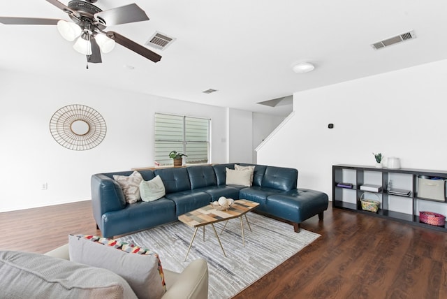 10701 Garbacz Dr, Austin, TX 78748 - living room with wood finished floors, a ceiling fan, and baseboards