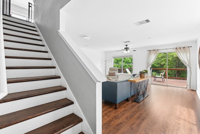 10701 Garbacz Dr, Austin, TX 78748 - stairs with wood finished floors and a ceiling fan