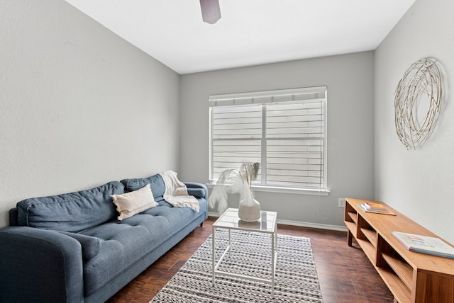 10701 Garbacz Dr, Austin, TX 78748 - living area featuring dark wood finished floors, a ceiling fan, and baseboards