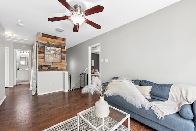 10701 Garbacz Dr, Austin, TX 78748 - living room featuring wood finished floors, ceiling fan, and baseboards