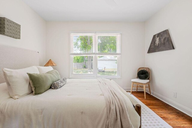 1200 Cullen Ave Unit B, Austin, TX 78757 - bedroom featuring baseboards and wood finished floors