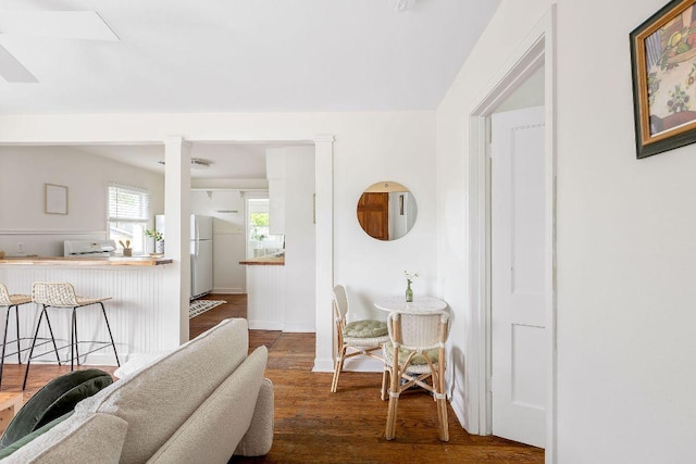 1200 Cullen Ave Unit B, Austin, TX 78757 - living room with wood finished floors, ornate columns, and baseboards