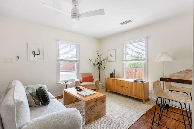 1200 Cullen Ave Unit B, Austin, TX 78757 - living area with light wood-style floors, visible vents, baseboards, and ceiling fan