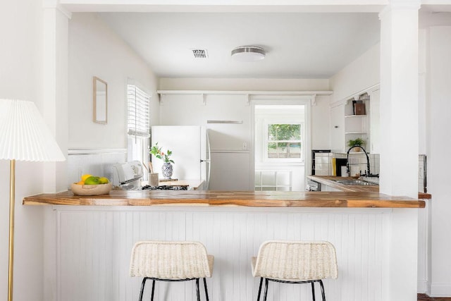 1200 Cullen Ave Unit B, Austin, TX 78757 - kitchen featuring freestanding refrigerator and stove