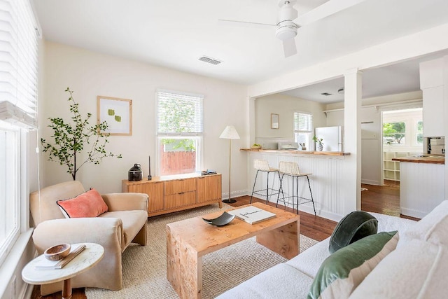 1200 Cullen Ave Unit B, Austin, TX 78757 - living room featuring a ceiling fan, wood finished floors, and visible vents