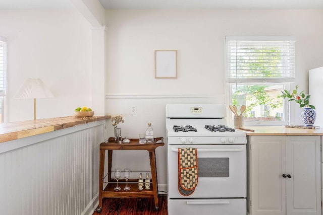 1200 Cullen Ave Unit B, Austin, TX 78757 - kitchen featuring light countertops and white gas range