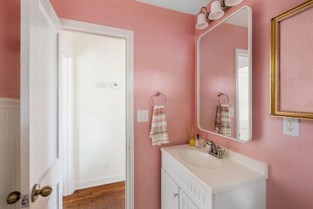 1200 Cullen Ave Unit B, Austin, TX 78757 - bathroom featuring vanity and wood finished floors
