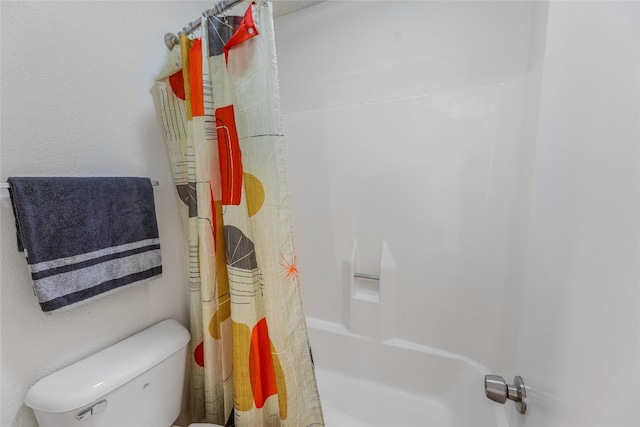full bathroom featuring toilet