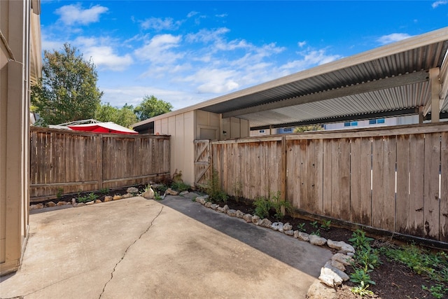 view of patio featuring fence