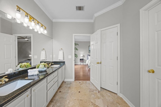 1107 Saint John Ct, Pflugerville, TX 78660 - ensuite bathroom featuring double vanity, visible vents, ornamental molding, and a sink