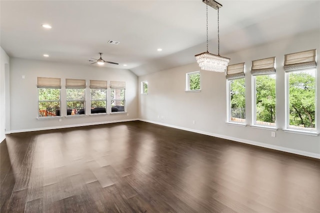 22621 Fountaingrass Ln, Lago Vista, TX 78645 - interior space with recessed lighting, dark wood-type flooring, visible vents, baseboards, and ceiling fan with notable chandelier