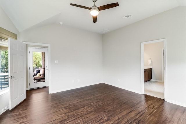 22621 Fountaingrass Ln, Lago Vista, TX 78645 - spare room featuring a ceiling fan, visible vents, baseboards, lofted ceiling, and dark wood finished floors