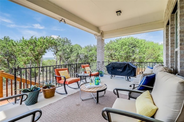 22621 Fountaingrass Ln, Lago Vista, TX 78645 - view of patio featuring outdoor lounge area, a grill, and a balcony