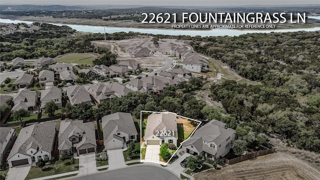 22621 Fountaingrass Ln, Lago Vista, TX 78645 - birds eye view of property featuring a residential view and a water view