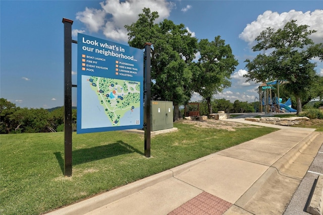 22621 Fountaingrass Ln, Lago Vista, TX 78645 - view of community with a yard and playground community