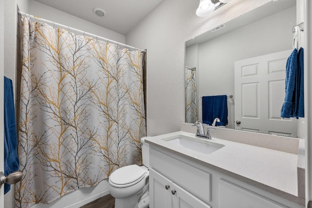 337 Akumal St, Leander, TX 78641 - bathroom with vanity, toilet, and shower / bath combo with shower curtain