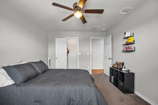 337 Akumal St, Leander, TX 78641 - carpeted bedroom featuring baseboards and a ceiling fan