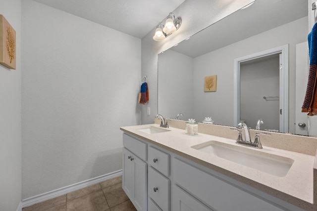 337 Akumal St, Leander, TX 78641 - full bath featuring double vanity and tile patterned floors