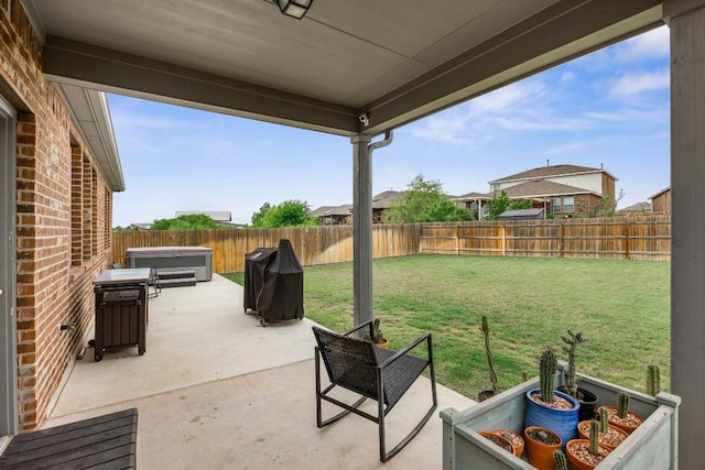 337 Akumal St, Leander, TX 78641 - view of patio featuring a hot tub and a grill