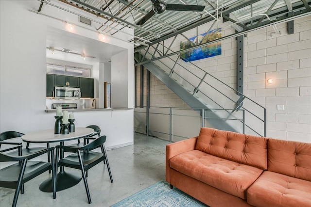 4801 S Congress Ave Unit D6, Austin, TX 78745 - living room with concrete flooring and visible vents