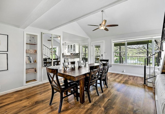 dining space with dark wood-style flooring, vaulted ceiling with beams, baseboards, stairs, and ceiling fan