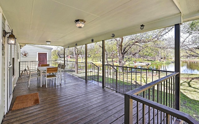 1318 Contour Dr, Burnet, TX 78611 - deck featuring a water view and outdoor dining area