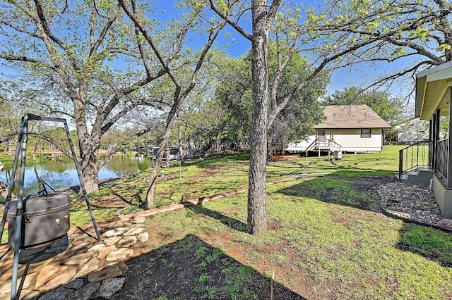 view of yard with a water view