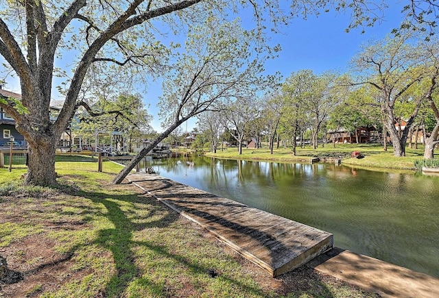 1318 Contour Dr, Burnet, TX 78611 - dock area featuring a water view and a lawn