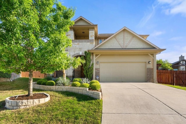 116 Silkstone St, Hutto, TX 78634 - view of front facade featuring driveway, an attached garage, brick siding, and stone siding