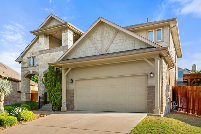 116 Silkstone St, Hutto, TX 78634 - view of front of property with concrete driveway, brick siding, and stone siding