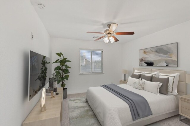 bedroom with visible vents and ceiling fan