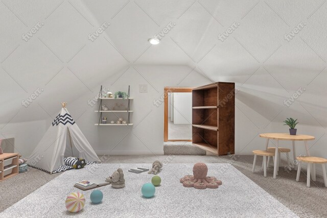 carpeted bedroom with vaulted ceiling