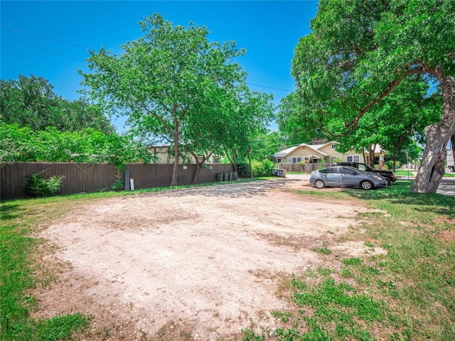 view of yard featuring fence