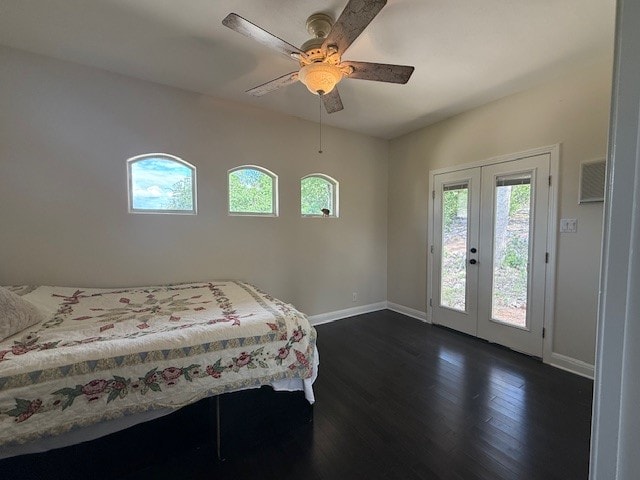 bedroom featuring baseboards, access to outside, and dark wood-style flooring