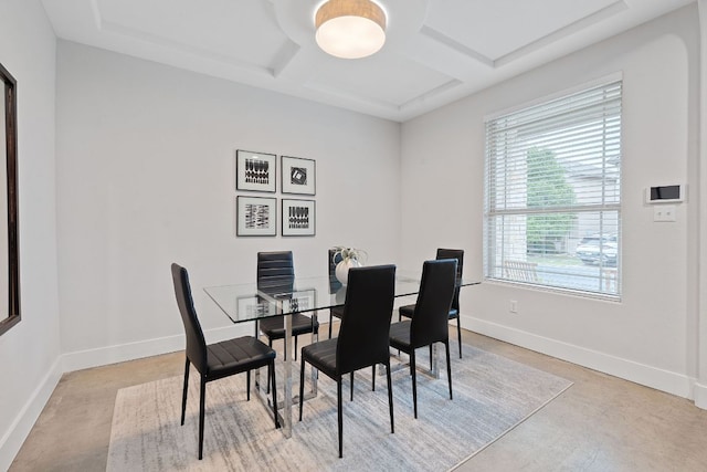 6224 Aviara Dr Unit E14, Austin, TX 78735 - dining room featuring coffered ceiling, concrete flooring, and baseboards