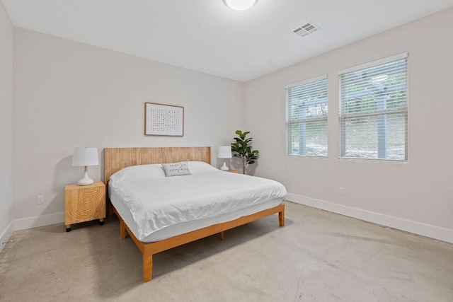 6224 Aviara Dr Unit E14, Austin, TX 78735 - bedroom featuring baseboards and concrete flooring