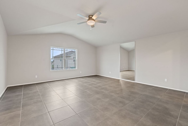 6224 Aviara Dr Unit E14, Austin, TX 78735 - tiled empty room featuring lofted ceiling, a ceiling fan, and baseboards