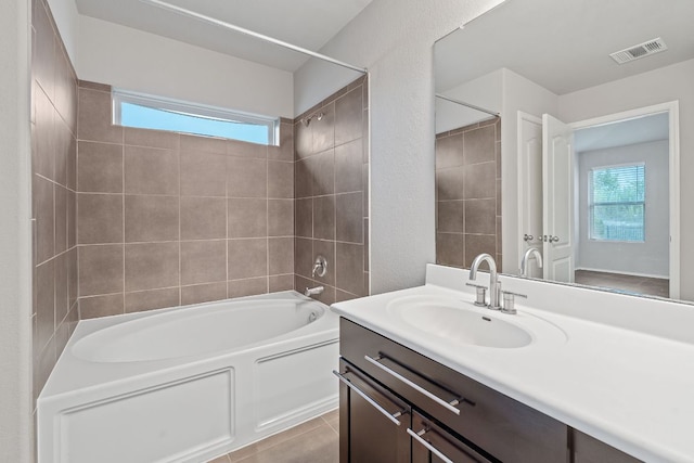 6224 Aviara Dr Unit E14, Austin, TX 78735 - full bathroom with plenty of natural light, shower / tub combination, and vanity