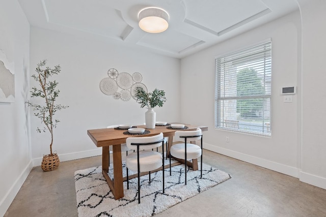 6224 Aviara Dr Unit E14, Austin, TX 78735 - dining space featuring finished concrete floors, coffered ceiling, and beamed ceiling