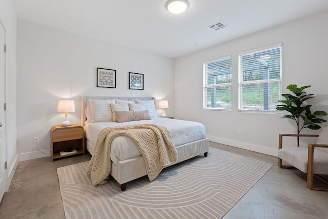 6224 Aviara Dr Unit E14, Austin, TX 78735 - bedroom with concrete floors and baseboards