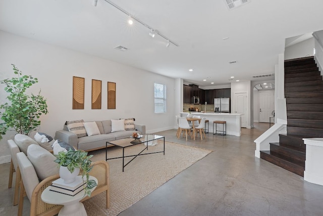 6224 Aviara Dr Unit E14, Austin, TX 78735 - living room featuring stairs, concrete floors, and recessed lighting