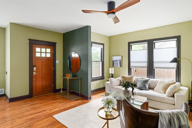 1709 Bouldin Ave, Austin, TX 78704 - living room featuring light wood-type flooring, ceiling fan, and baseboards