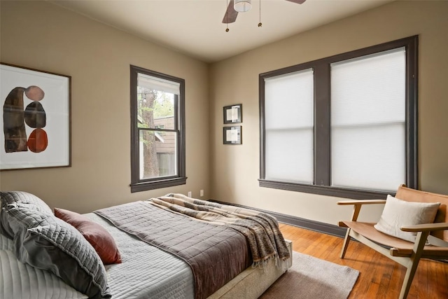 1709 Bouldin Ave, Austin, TX 78704 - bedroom with wood finished floors and a ceiling fan