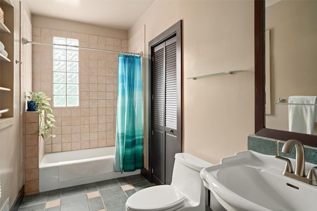 1709 Bouldin Ave, Austin, TX 78704 - bathroom with a sink, shower / tub combo, toilet, and tile patterned floors