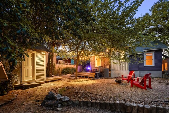 1709 Bouldin Ave, Austin, TX 78704 - view of yard featuring a fire pit and an outbuilding