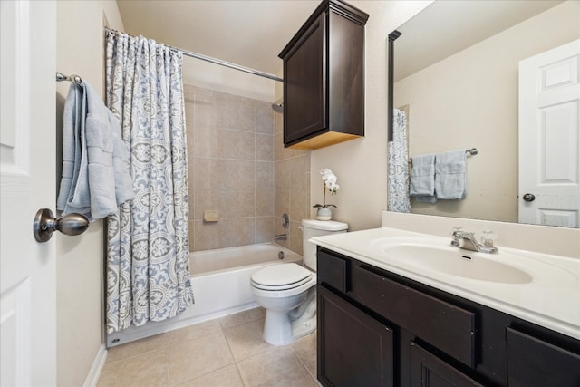 bathroom with toilet, tile patterned flooring, shower / bathtub combination with curtain, and vanity