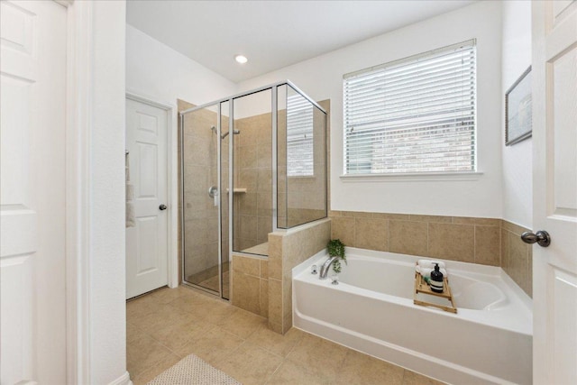 bathroom with a shower stall, a garden tub, tile patterned flooring, and recessed lighting